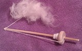Spindle with yarn